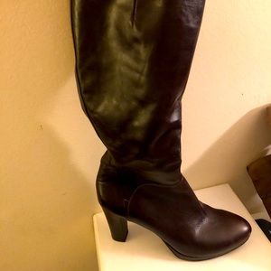 Knee high platform leather boots block heel.